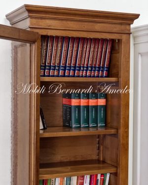 Vetrina libreria realizzata in legno massello di noce ad 1 anta